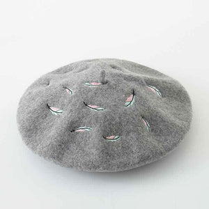 Comfy and soft wool women beret with embroidered feather 
